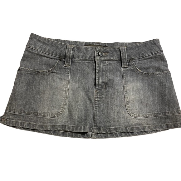 Y2k Grayish / tan stitching
denim mini skirt with pocket button. - Picture 1 of 5